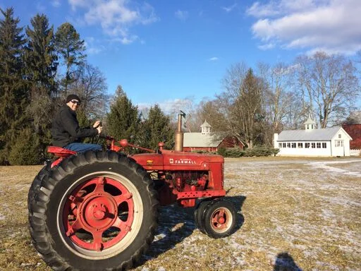 Tyler on Red Tractor.jpeg