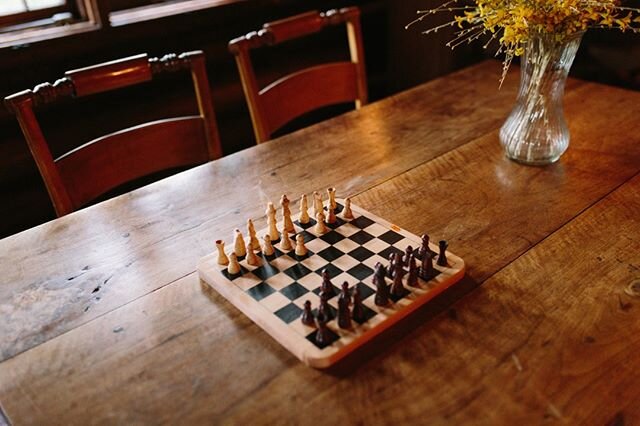 From a game of chess to a glass of wine at @grassycreekwinery we've got goodies for rainy days too. #klondikecabins #northcarolina