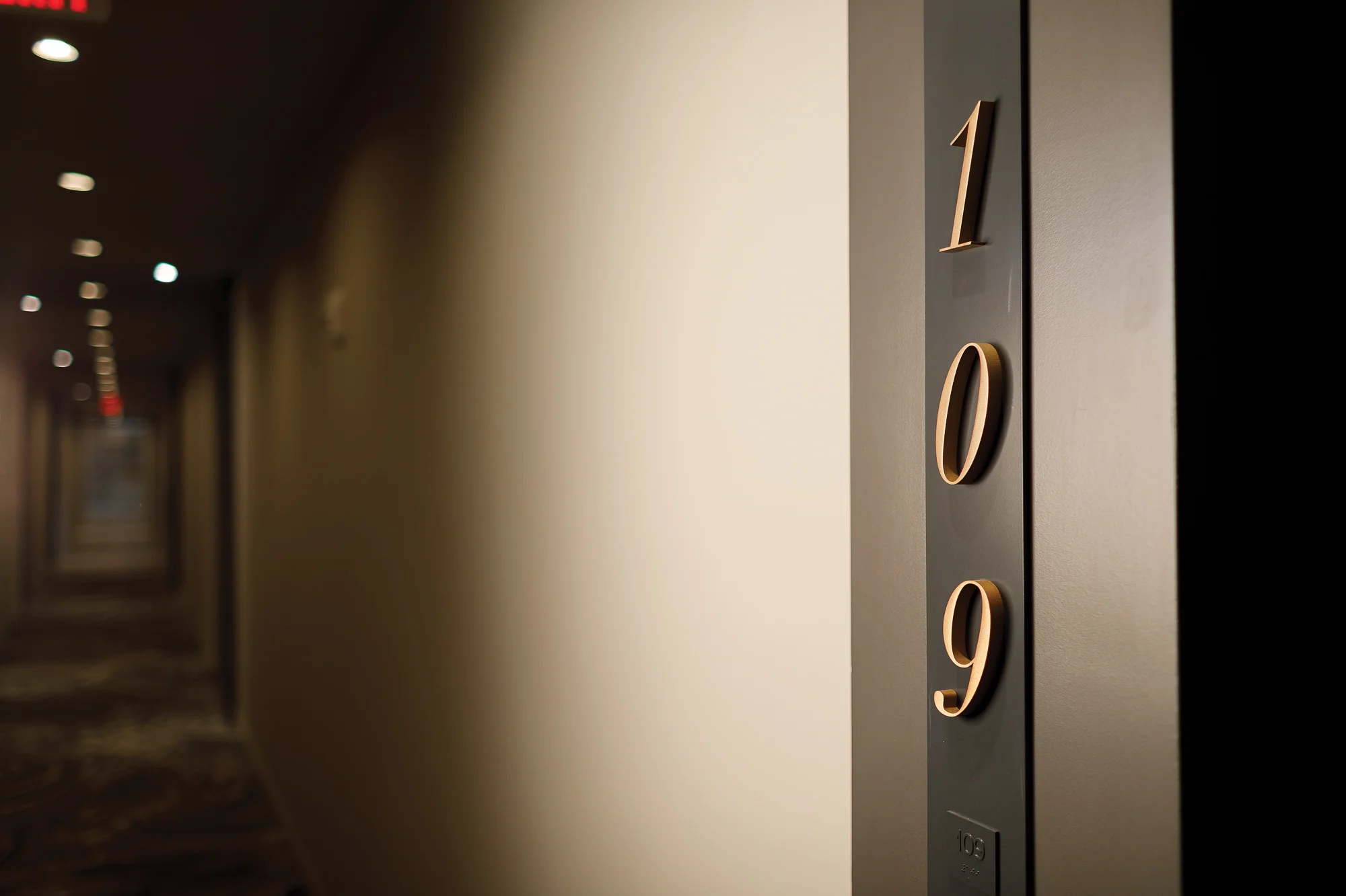 Custom residence signage: ADA compliant with braille and tactile numerals
