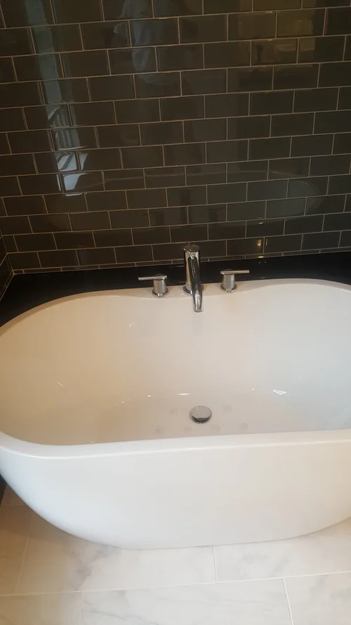 Bath with Floating Vanity & Black Glass Tile in Royersford, PA, photo 1