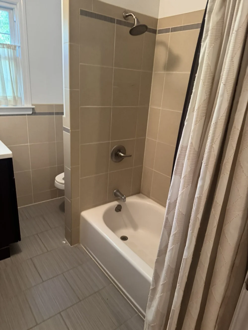 Hallway Bath Turned Primary Bathroom in Blue Bell, PA, before