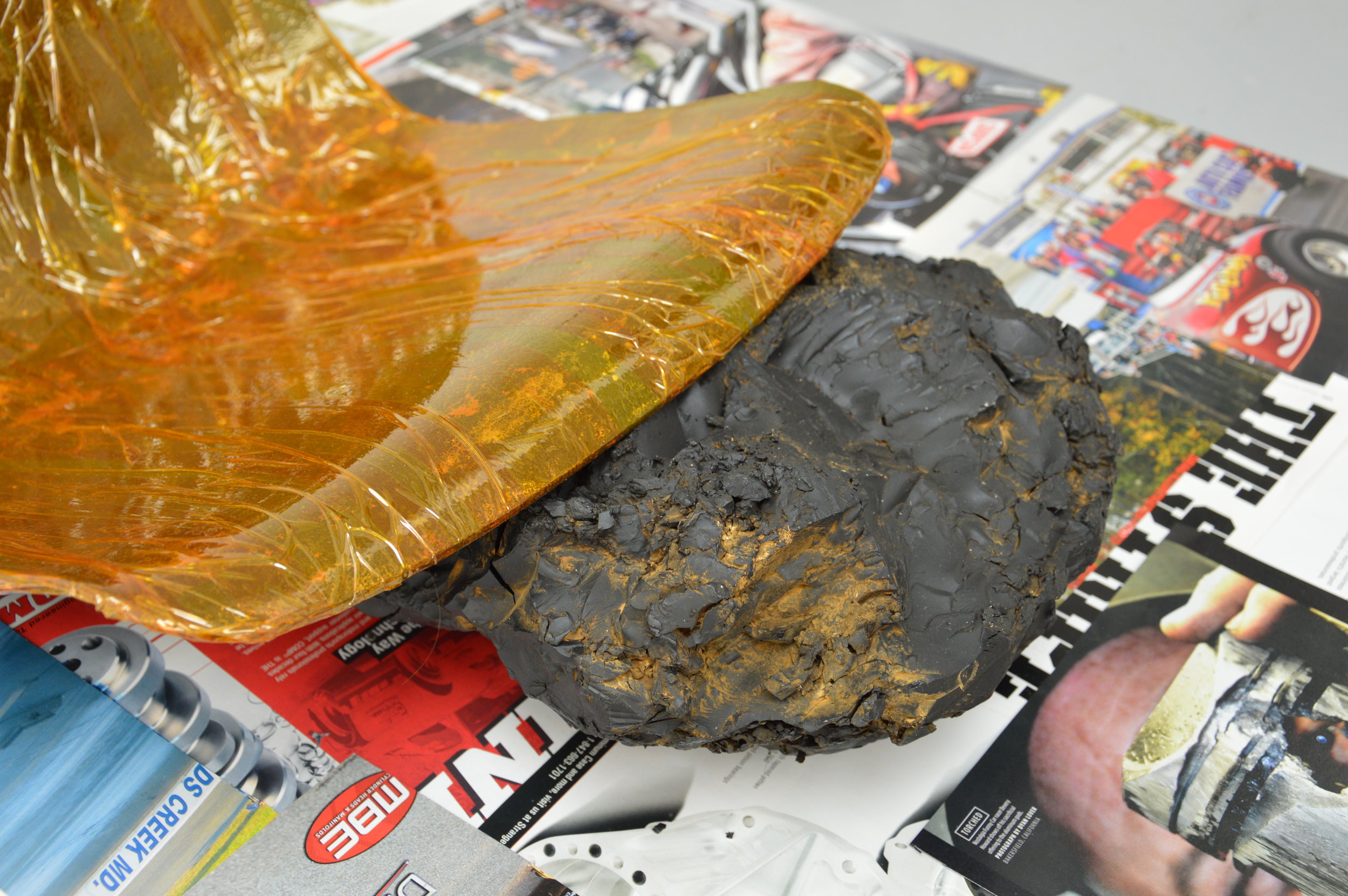 Peak Particle Velocity 2018 Drag Illustrated cut-outs, HDPE seat, oxidized bitumen, polyimide tape, Monster Energy cans 500ml & spoken word 162x84x41cm