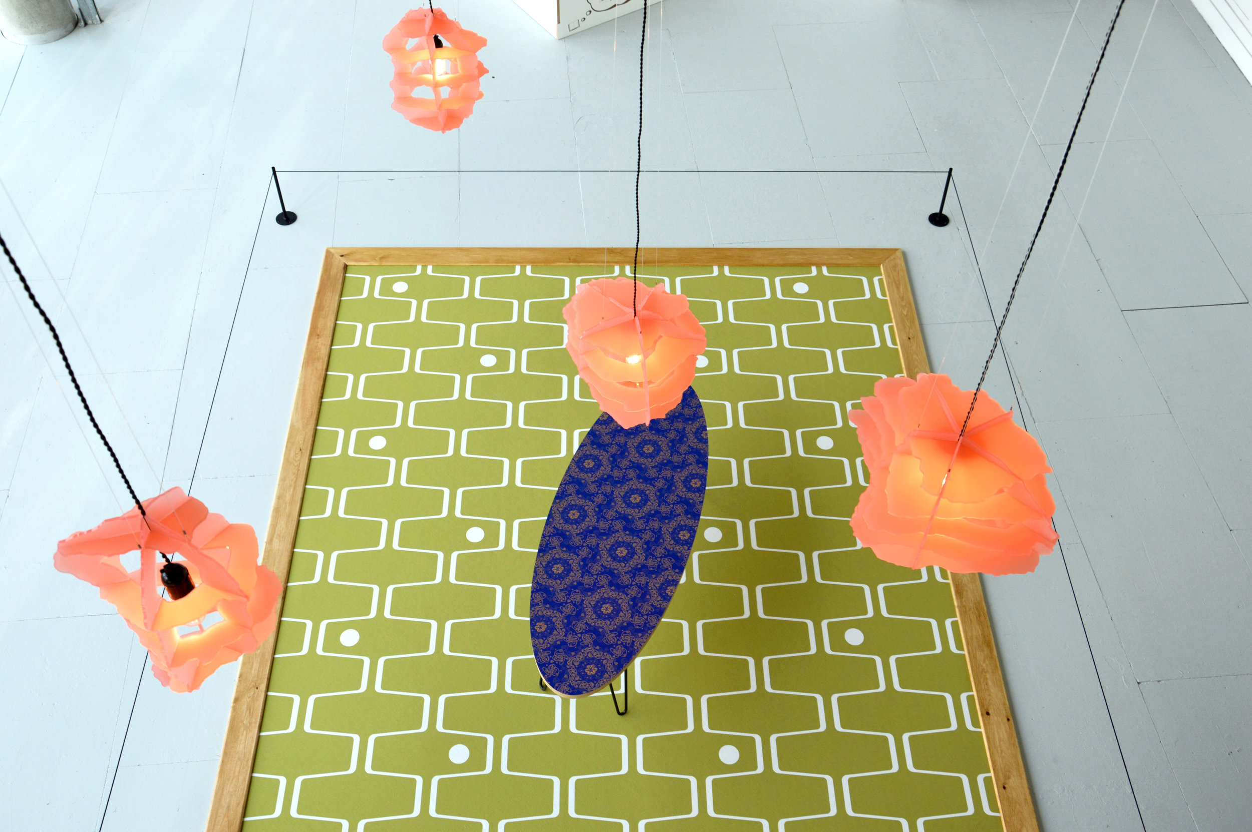 Modern Showpiece 2019 Rendition #1 2019 Digital print on synthetic photographic carpet, pine & wax 384 x 274 x 2.2cm Rendition #2 2019 Digital print on laminate, plywood & hairpin legs 138 x 50 x 43cm Rubble Lamp #1-5 2019 Perspex, Bakelite fitting, light bulbs, braided cable & nylon Dimensions variable