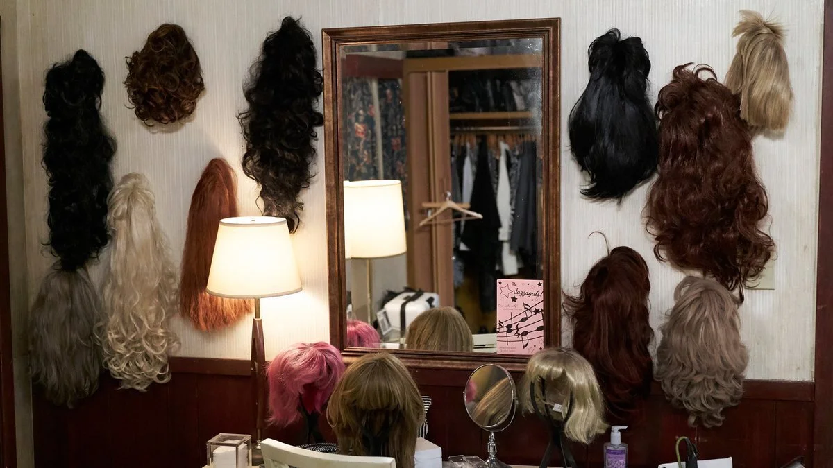 Moira’s wall of wigs // Photo via PopTV