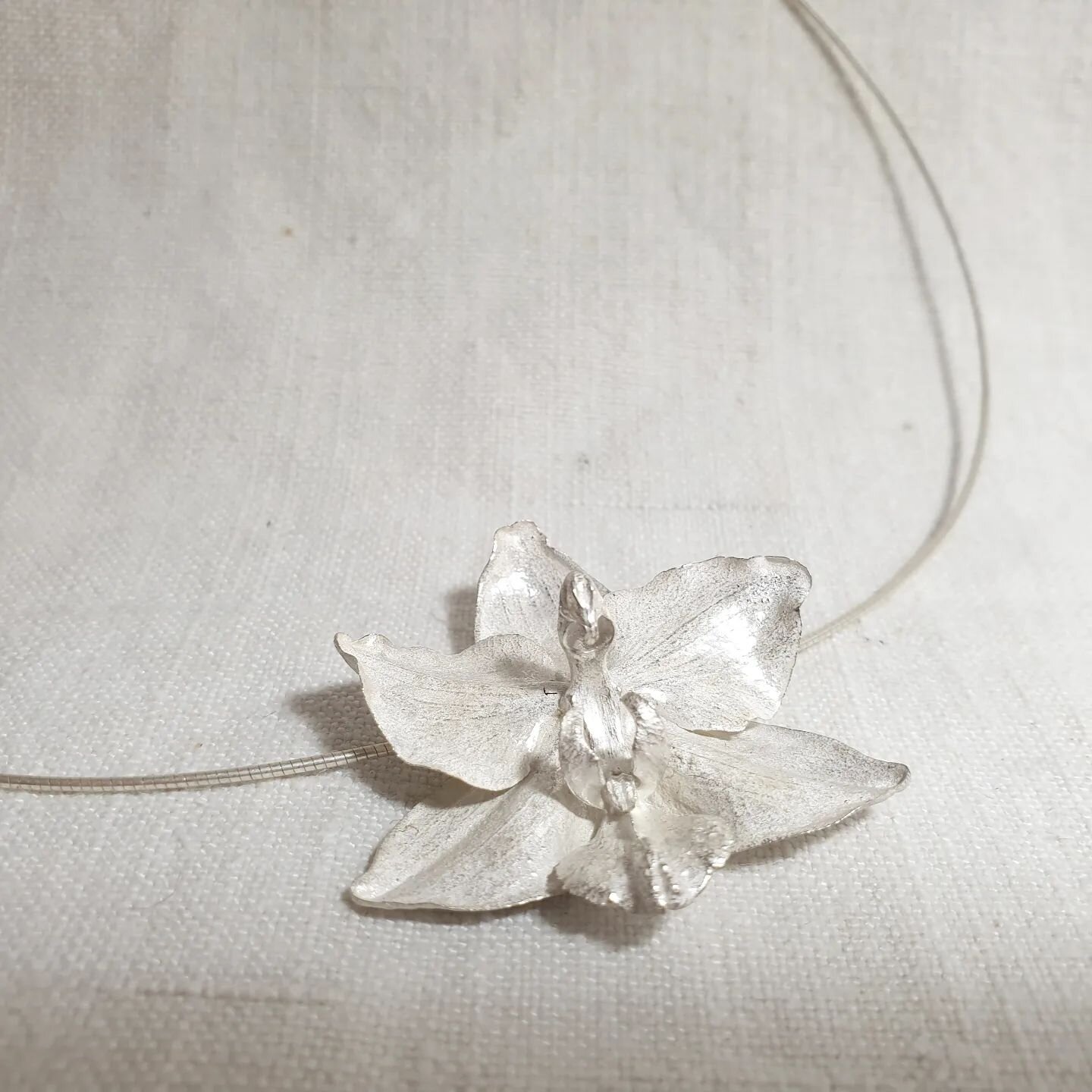 Orchid pendant. 
.
#botanicals #flowers #orchids #castings