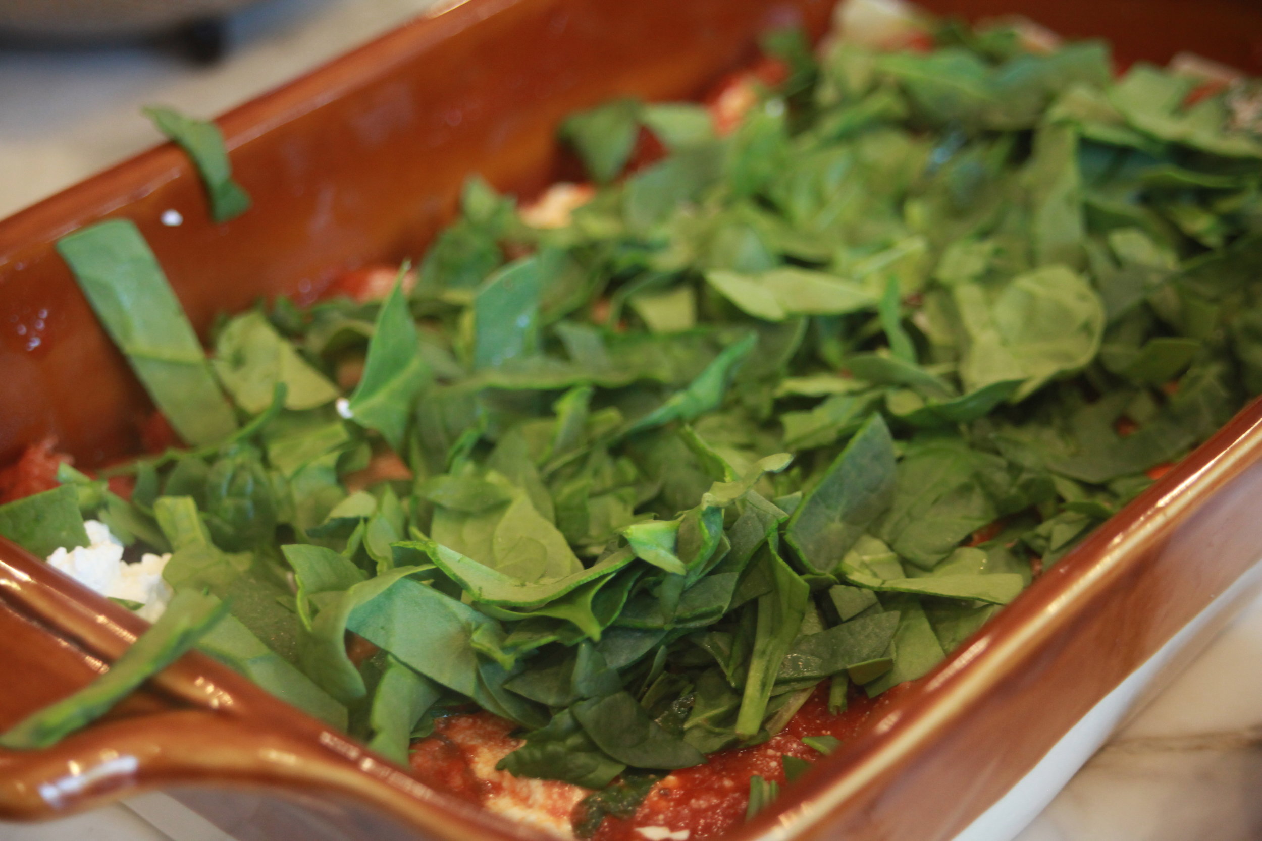 Lasagna assembly (spinach layer)