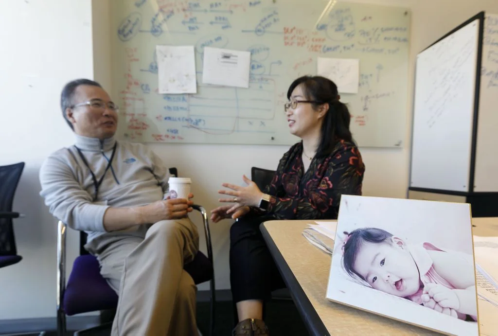 Jae W. Lee (left) keeps a photo of his daughter Yuna on his desk. Soo (right) says their research gives them hope for their daughter. “The ability to better understand my daughter’s condition inspires me to keep moving forward. I am a more optimistic scientist because of her.” (OHSU/Kristyna Wentz-Graff)