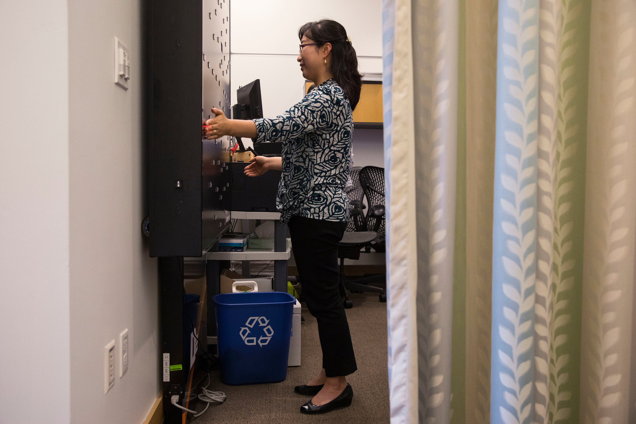 Soo-Kyung’s peripheral vision being tested at an occupational therapy session. She suffered a collapse in 2016 from the stress of juggling her scientific career while caring for Yuna, and dealt with the after-effects of vertigo.CreditRuth Fremson/The New York Times