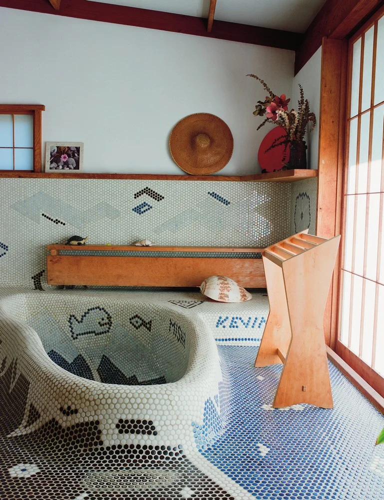 penny-tiled bathroom in the Reception House, embedded with the designer’s family crest (back right) and the names of his grandchildren. The sliding shoji door leads to a moon-viewing platform.