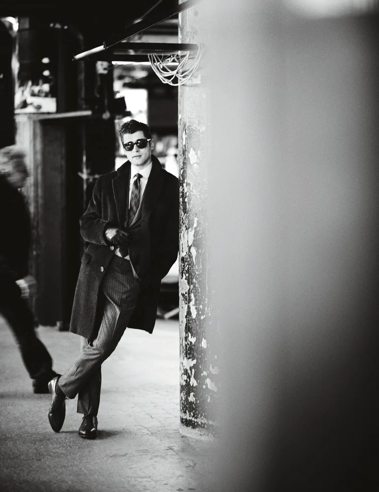 Cashmere overcoat, cashmere and wool blend suit, cotton shirt, and tie BRIONI sunglasses OLIVER PEOPLES gloves HERMÈS socks PANTHERELLA shoes JOHN LOBB