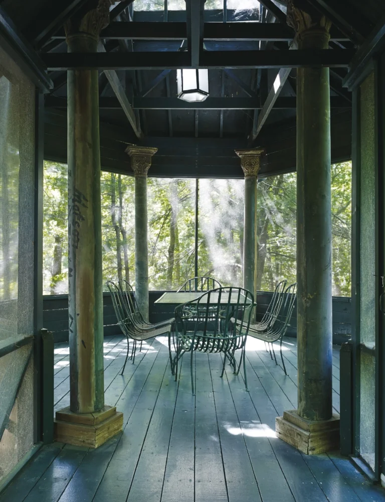 view of the screened-in porch of the guest house.