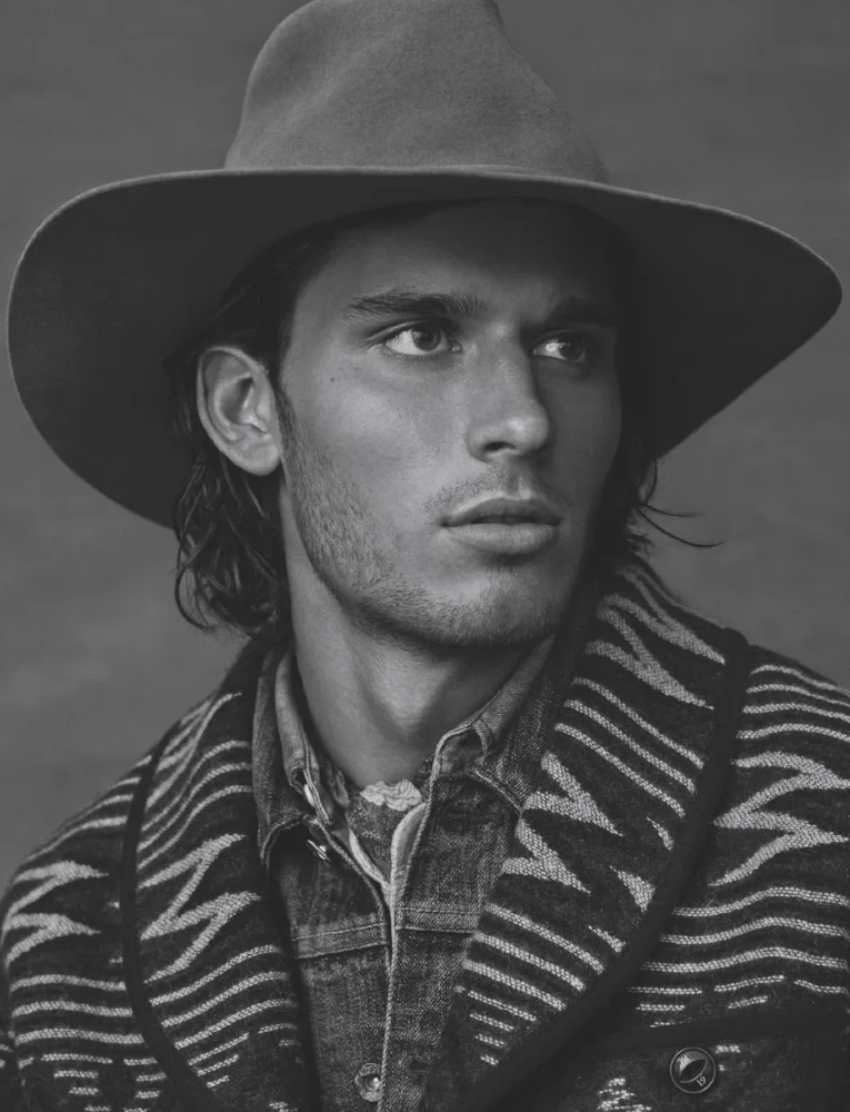 ERIC Wool coat, denim jacket, and cotton henley NEIGHBORHOOD chambray denim shirt SIMON MILLER silk print bandana DUNHILL beaver fedora RESISTOL