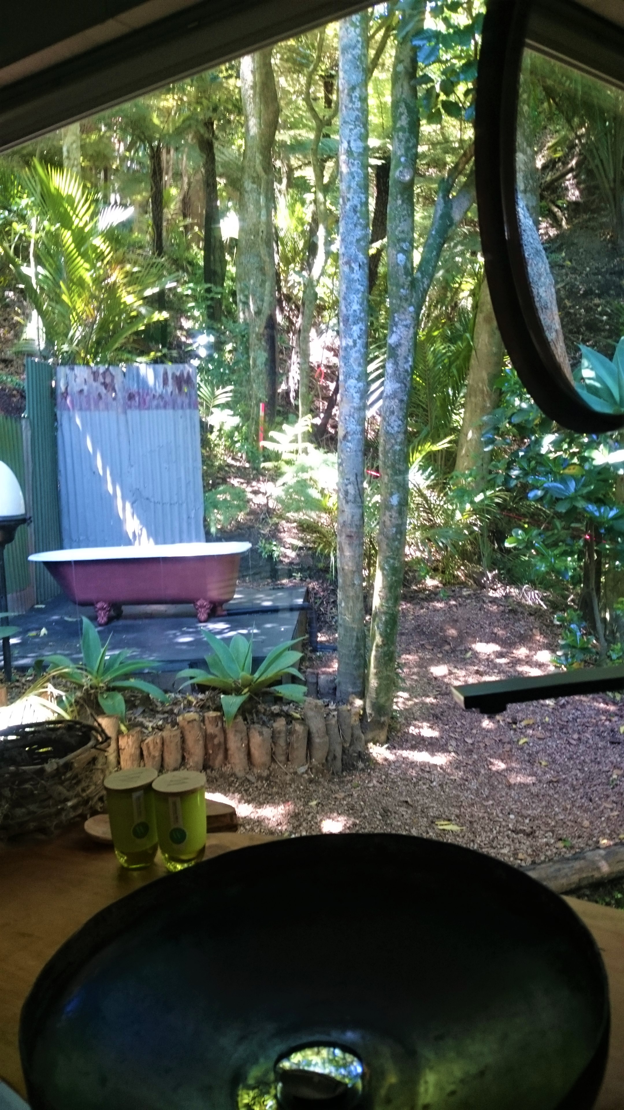 The outdoor bath looks over the bird sanctuary
