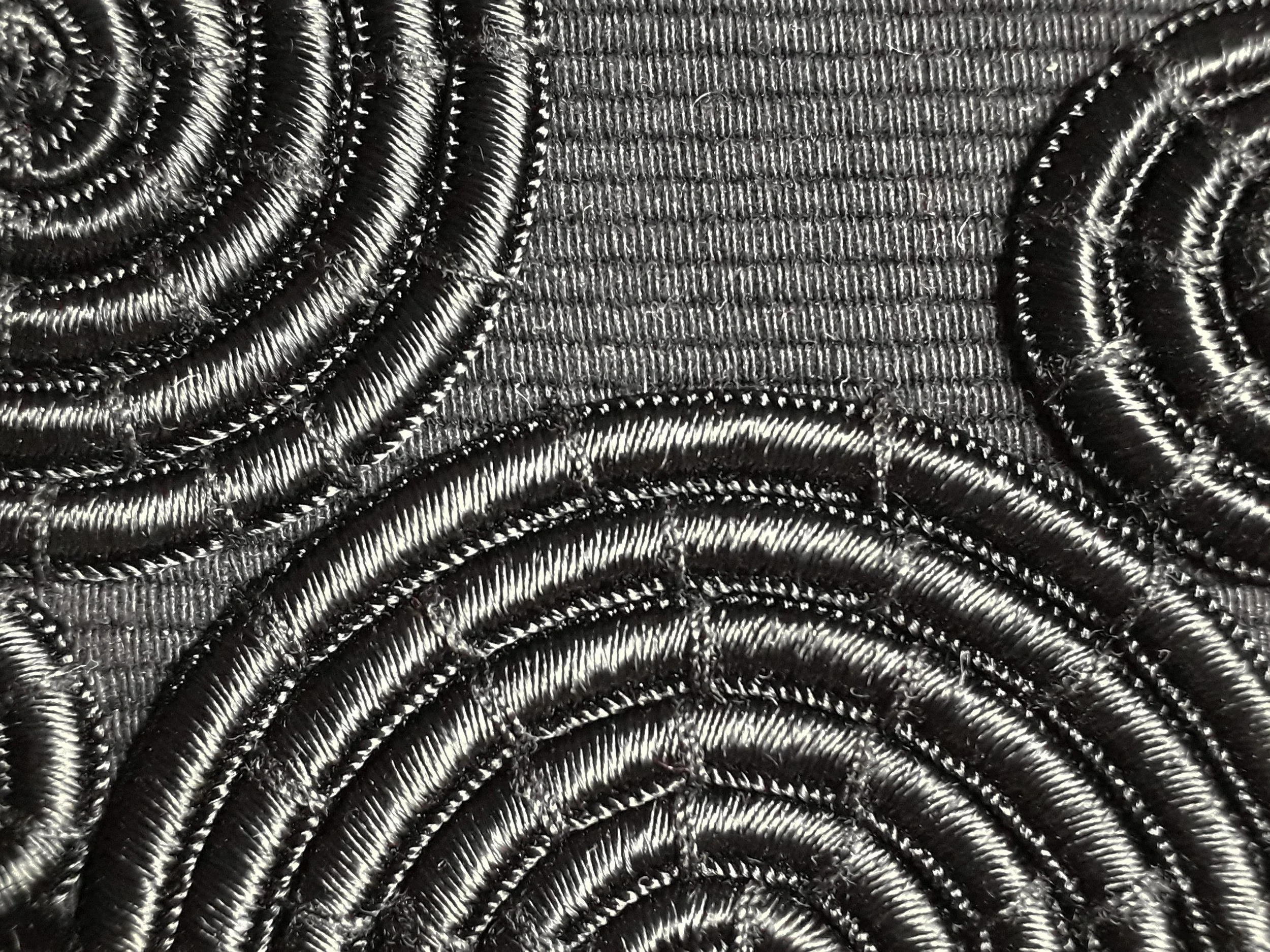 Black spiral couch CU.jpg