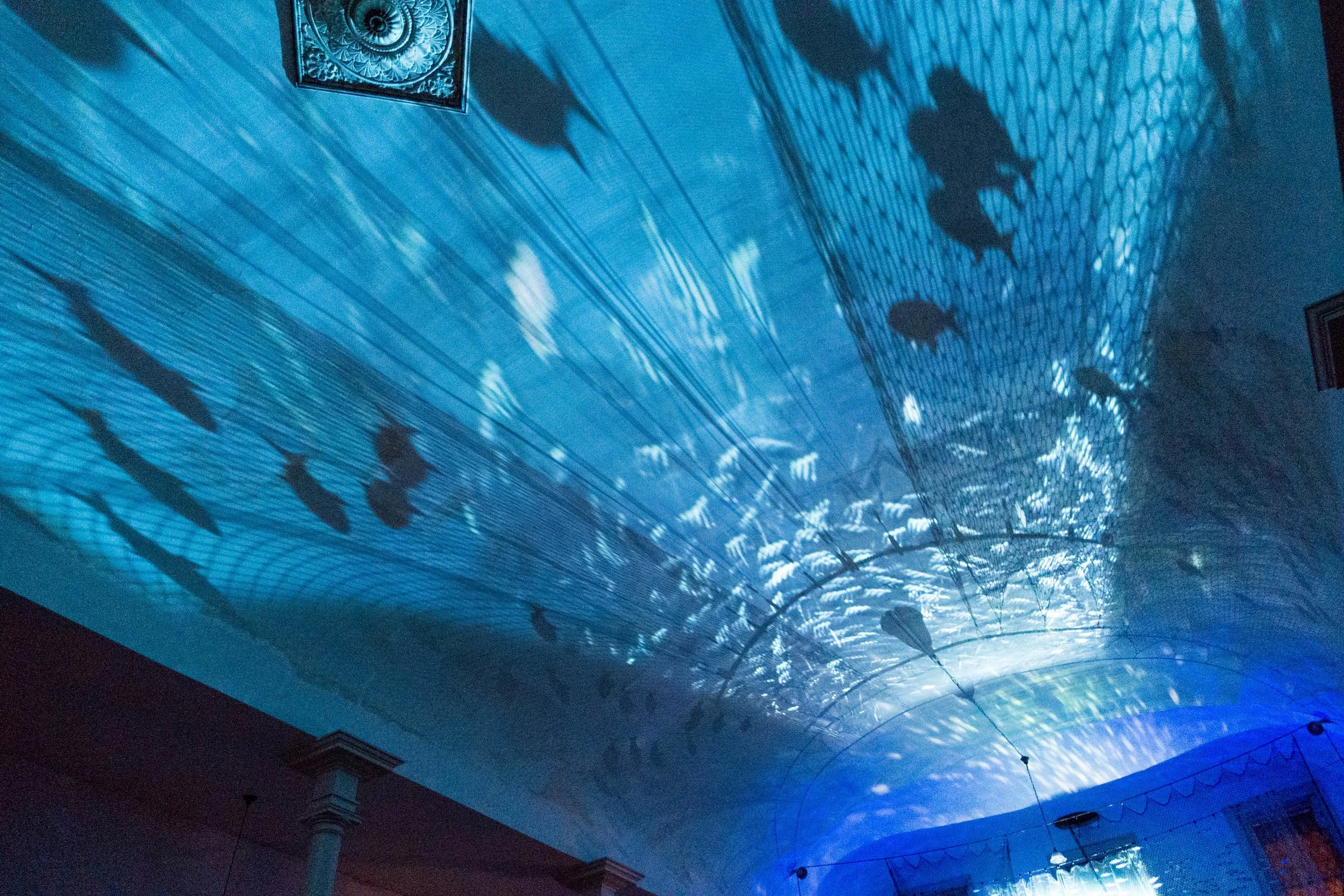 Sardinia , 2016, recycled plastic, wood, found materials, video projection and sound, site specific installation at North Church, Eastport Maine original sound piece by David Cheney/Charles Harding, video editing Ryan O'Toole