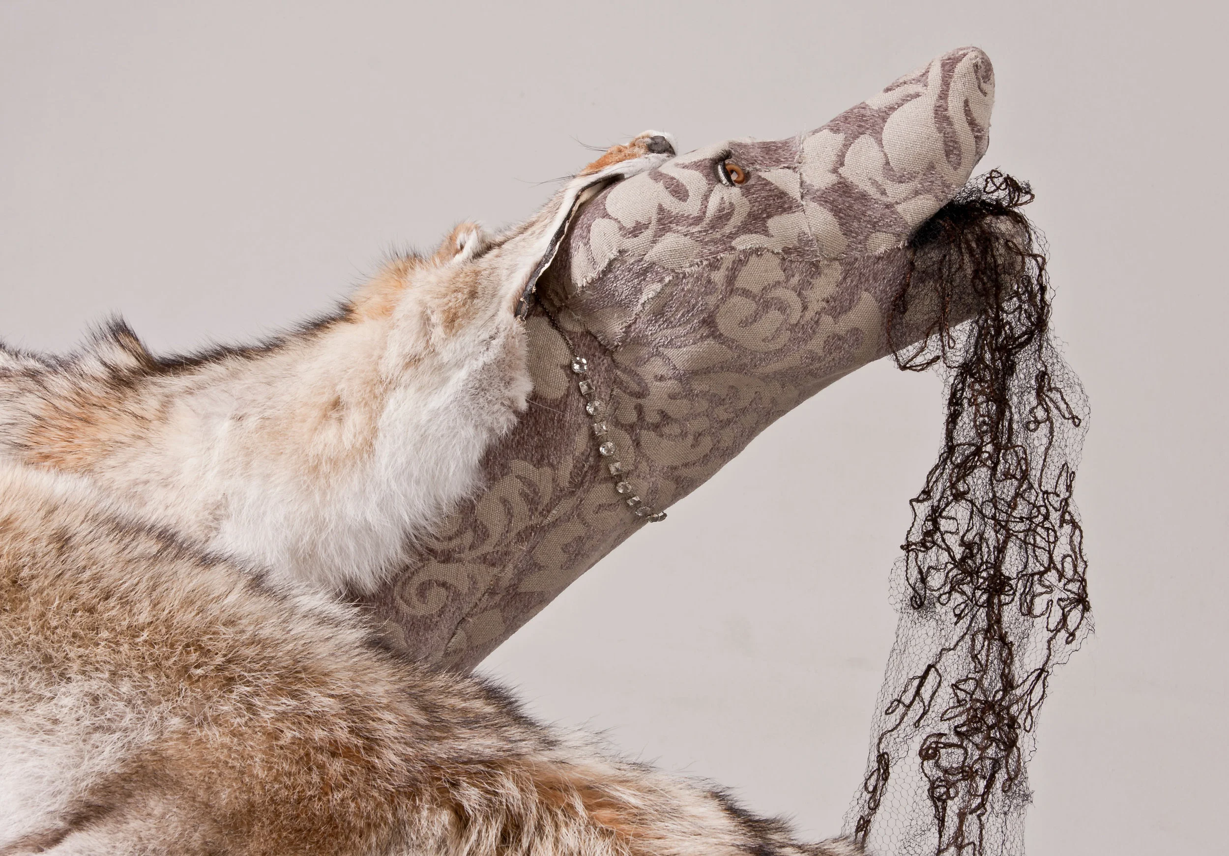 Coy Wolves , 2010, textile over taxidermy forms, found fur and accessories Photo: Jeff Crawford