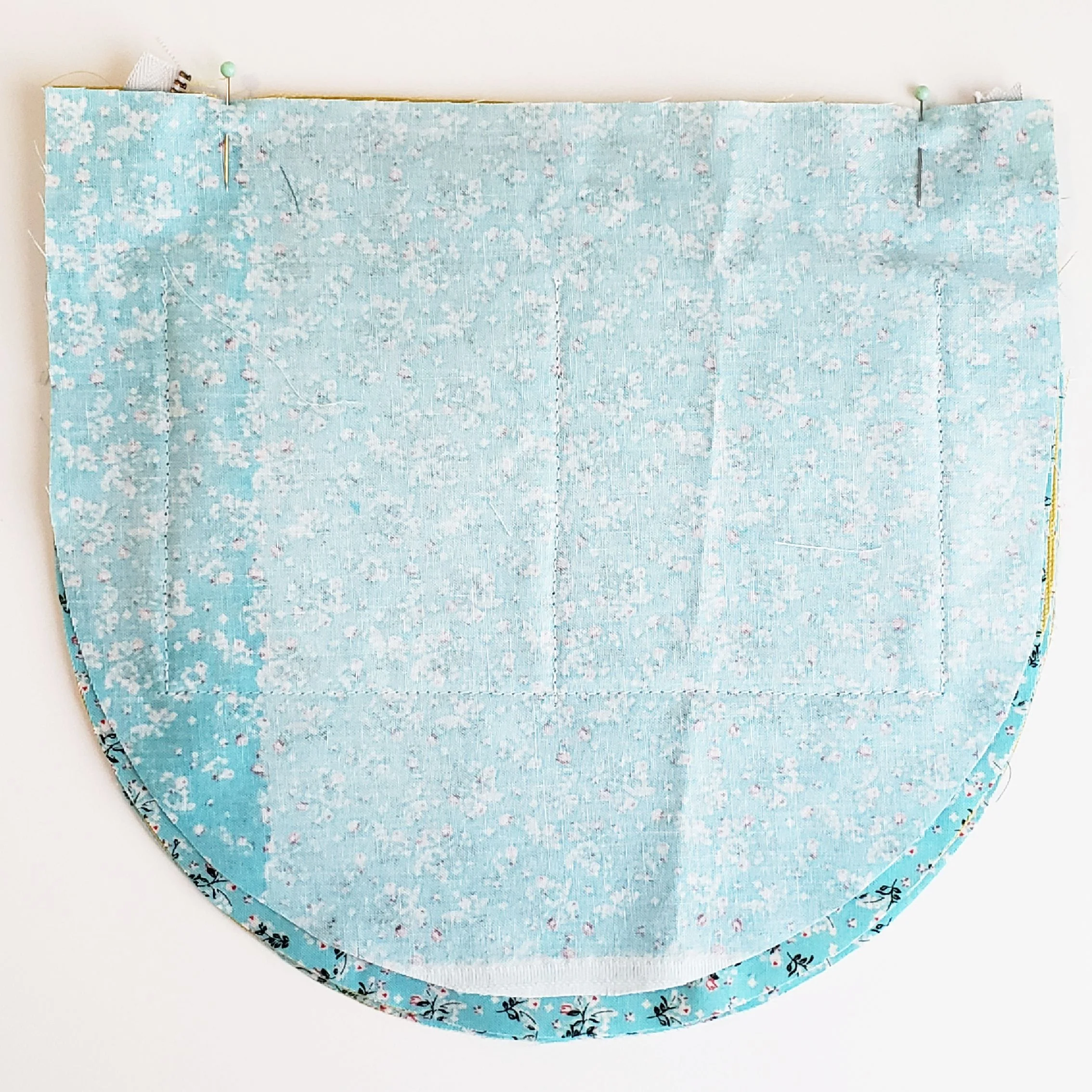 5. Align top of Lining with top of Main Body and pin in place. Sew at 3/8” seam allowance with zipper foot.