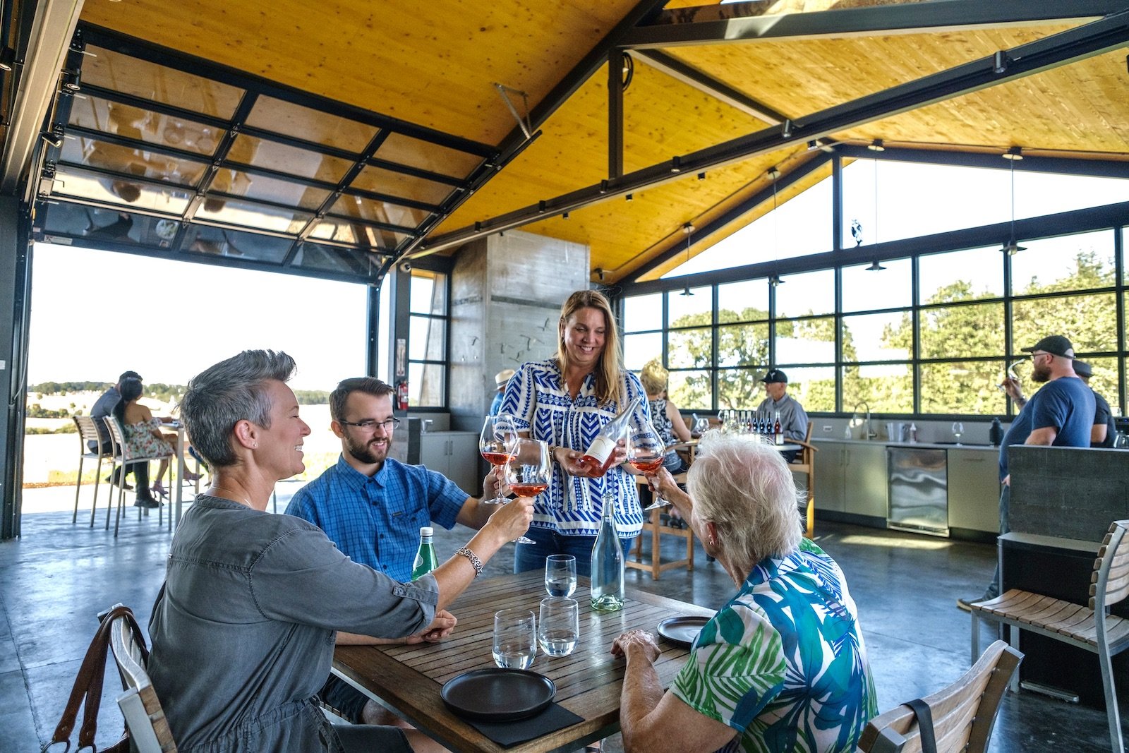 Guests being served on the East patio