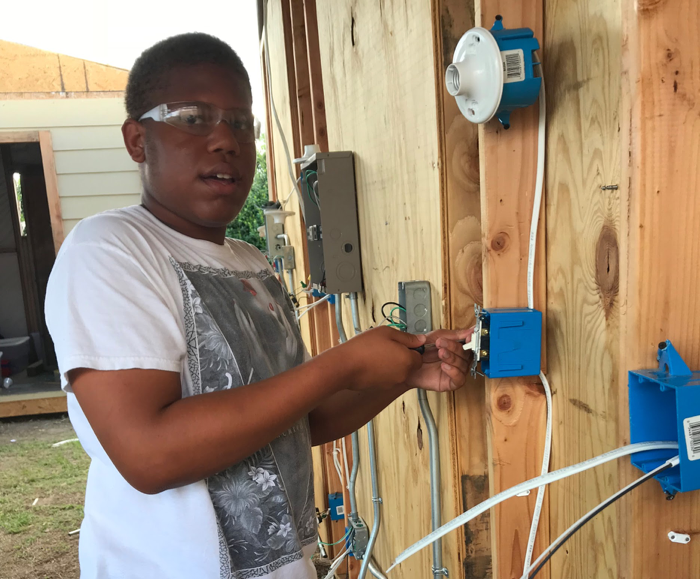 Alton Halloway, Jr. will be starting his junior year at Sophie B. Wright Charter School this fall. This summer, he’s working toward an industry-recognized credential.
