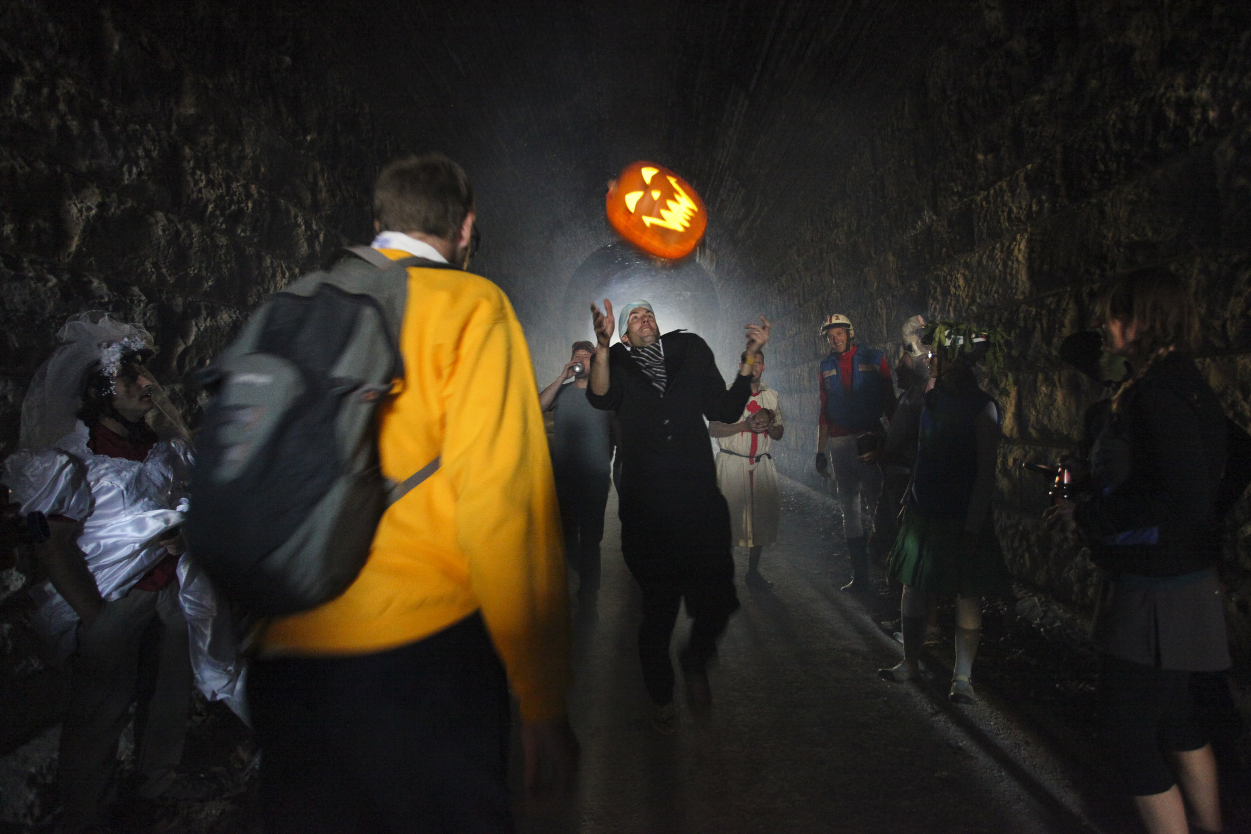   Monster Bike Bash Costume Contest participants go through a tunnel in Rocheport, Mo. 