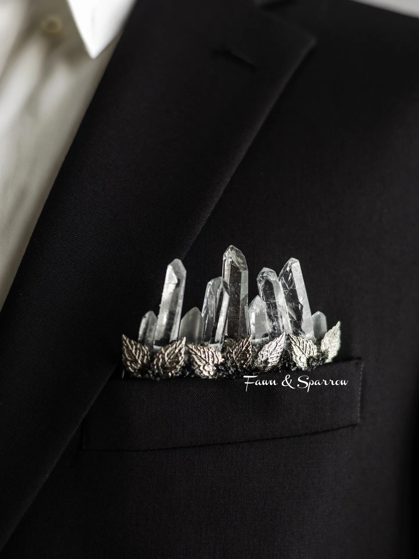 New! Mystical crystal pocket boutonniere and tiara are designed for those who want to break tradition without breaking style. Inspired by gothic tones and a modern rebellious vibe, this set is the perfect accessory for a fantasy wedding, black-tie ev
