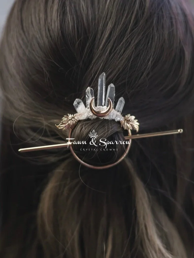 Quartz Crystal Hair Stick available now for purchase on our website or Etsy shop! This versatile piece can be used for all occasions! #hairstick #crystalaccessories #quartzhairpin #weddinghairinspo #weddinghairideas