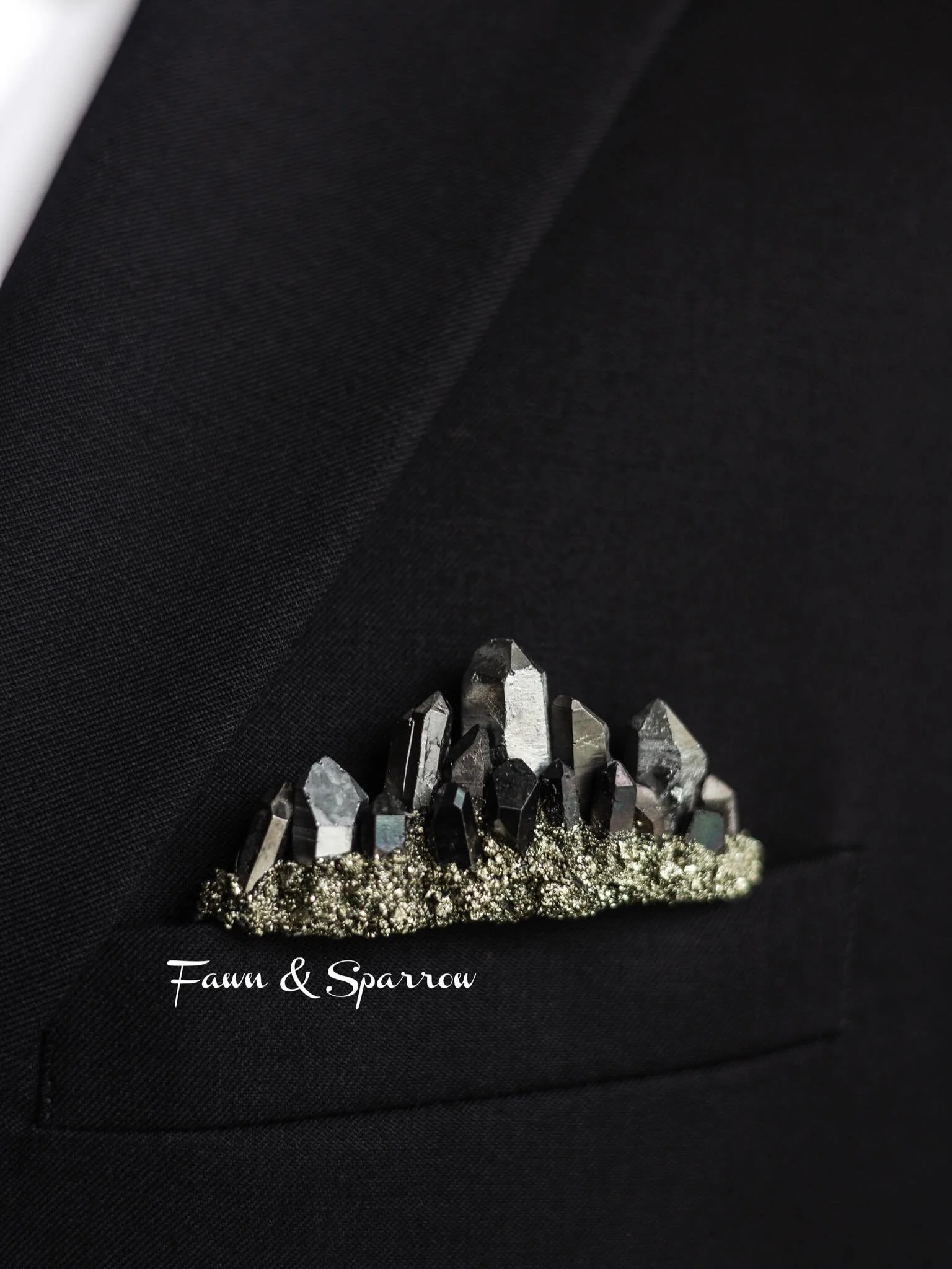 Several requests for a Silver and Black pocket boutonni&egrave;re, so we made some! This pocket accessory features Silver Quartz, Black Quartz, and Silver Pyrite! Link in our profile to purchase 🖤🩶#pocketsquares #mensbrooch #groomsbrooch #suitacces