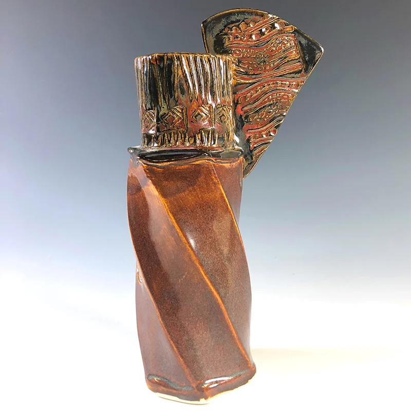 Spunky brown vase with touches of jasper