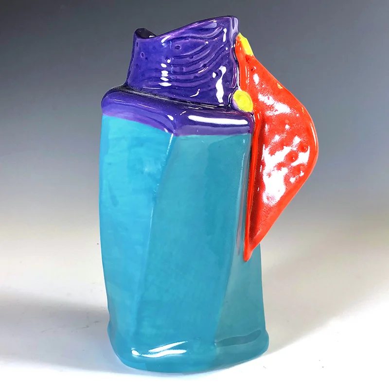 Wild orange winged vase in a field of blue and purple