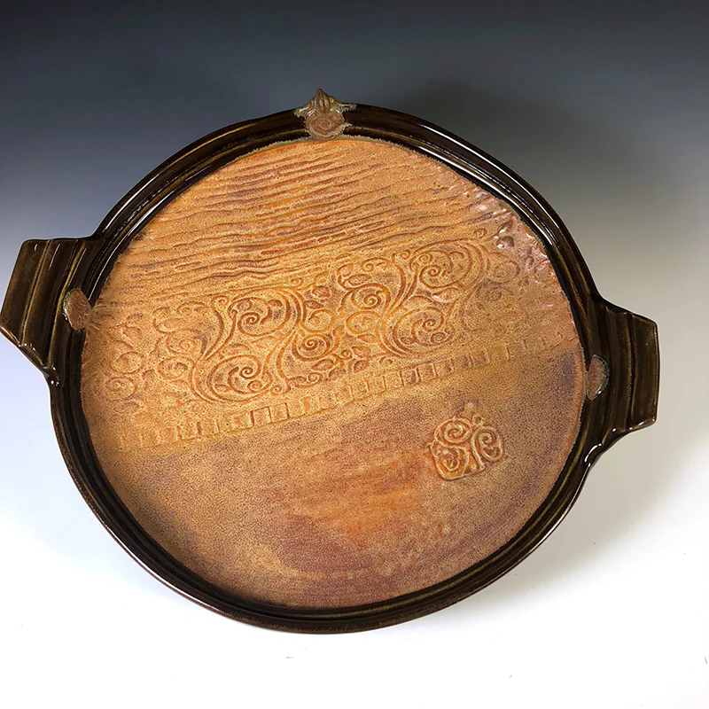 Elegant large textured serving platter is both for food and is 