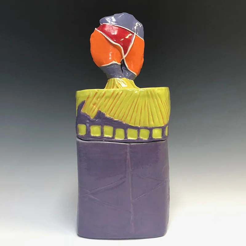 Vivid complimentary colors make this container a great conversation piece