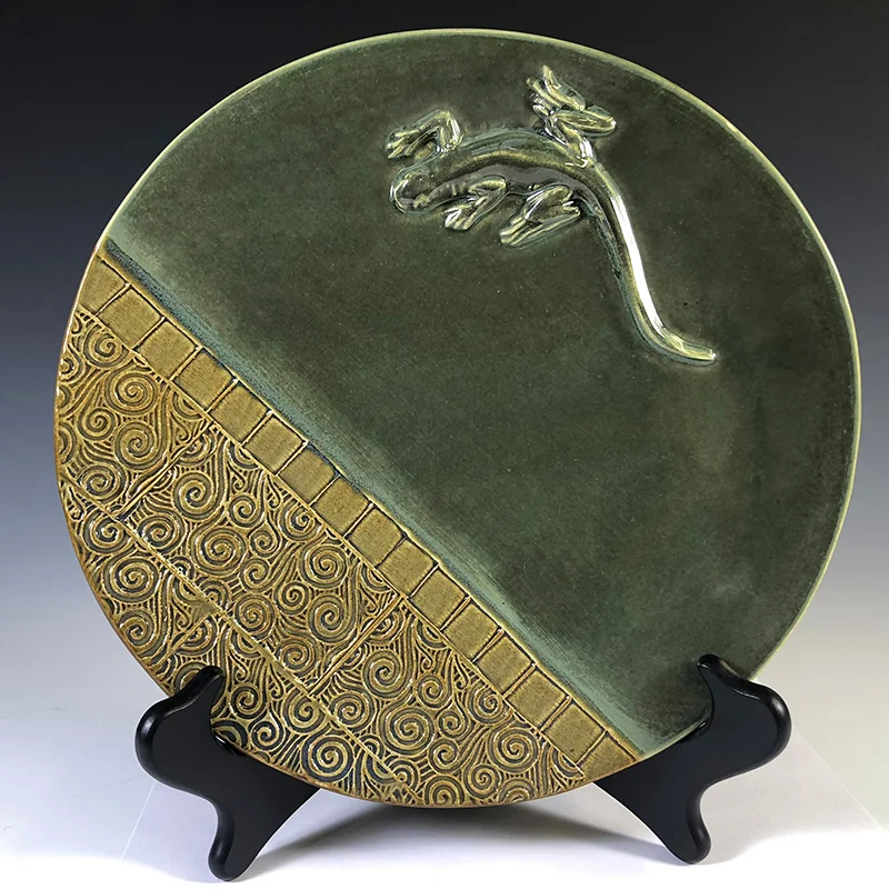 Gecko walking across this serving plate