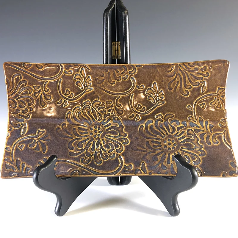 A serving plate full of chrysanthemums