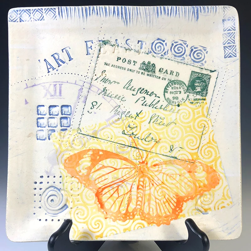 Overlapping silk screen images make this Art Feast serving plate a piece of art