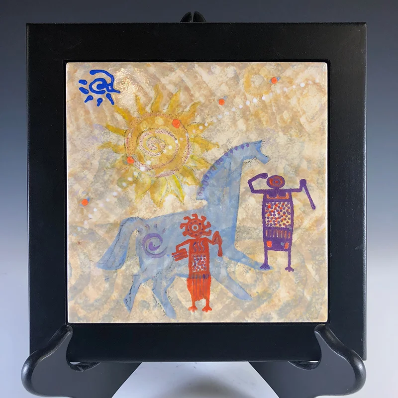 Silk screened petroglyph images on this wall art