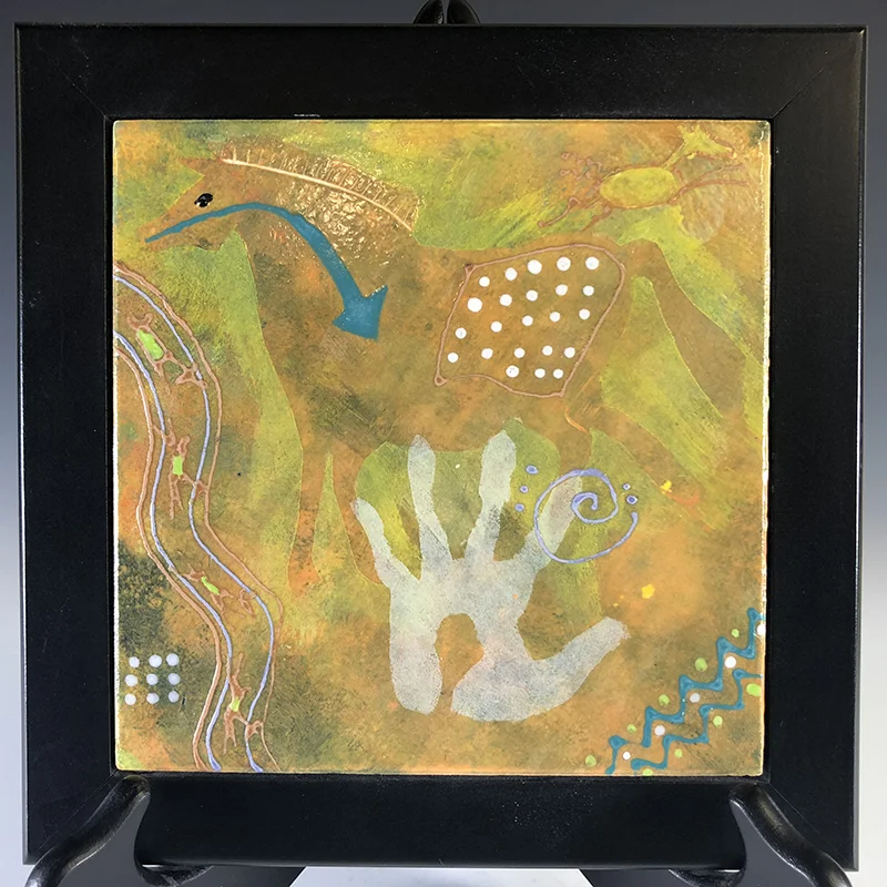 Handmade tile wall art or trivet uses petroglyph themes