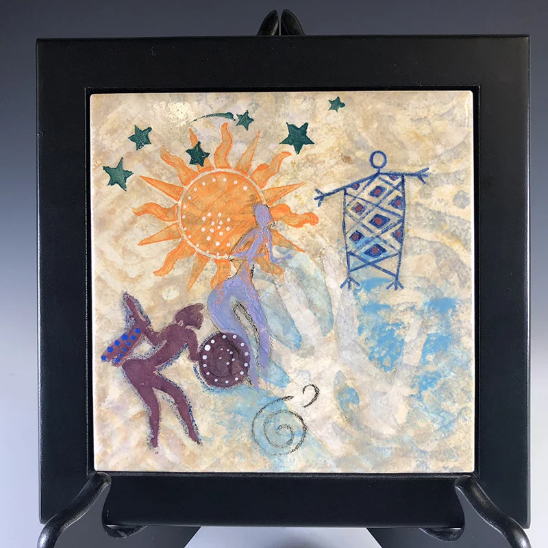 Symbols of human endeavors are silk screened on this tile