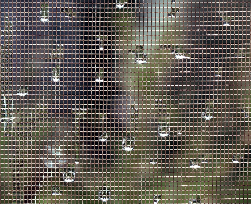 Raindrops in a Window Screen