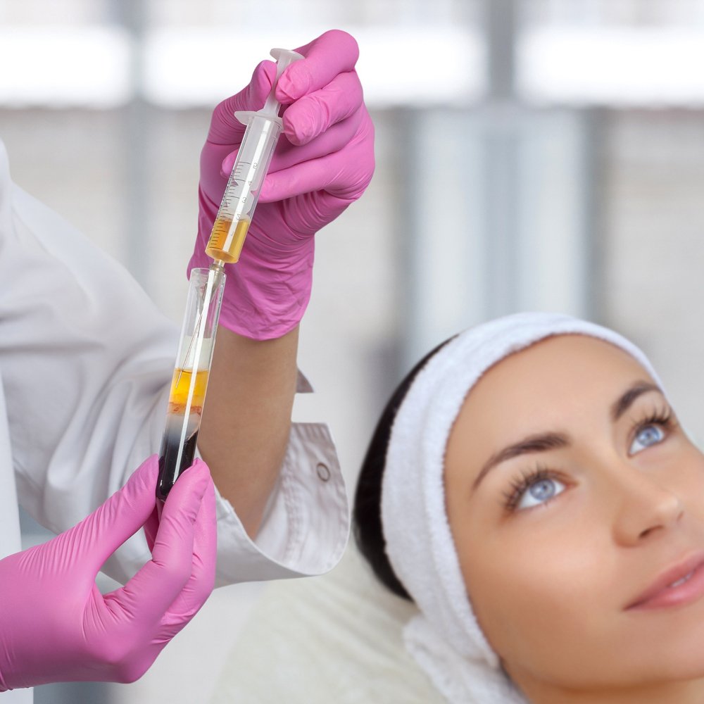 Provider preparing PRP to inject in patients face for under eye bags