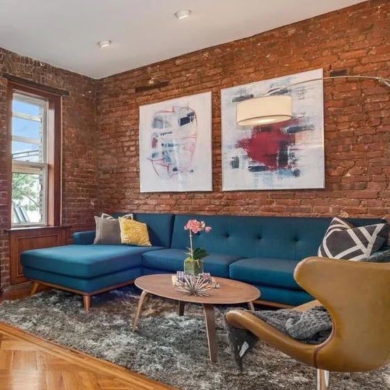 Dunefsky Design enlarged two paintings by Ilana Greenberg and framed them in plexi for the staging of a NYC apartment.