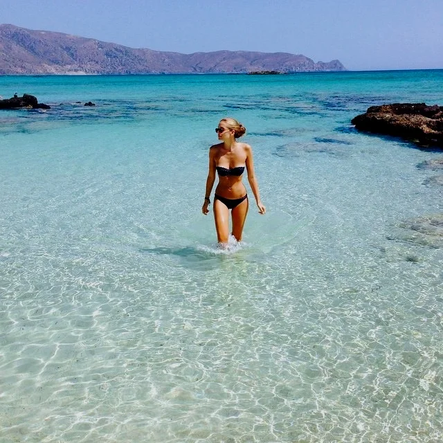 woman exiting water.jpeg
