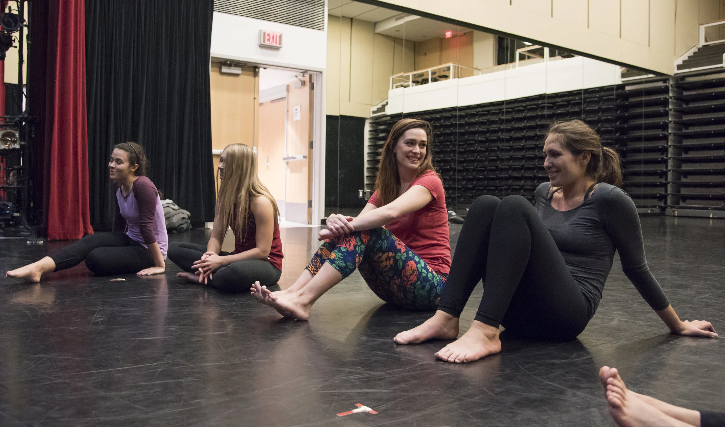  Sarah Tuberty talks to her friend before the start of the weekly aerial dance class she takes at Boston University's Fitness and Recreation Center. 