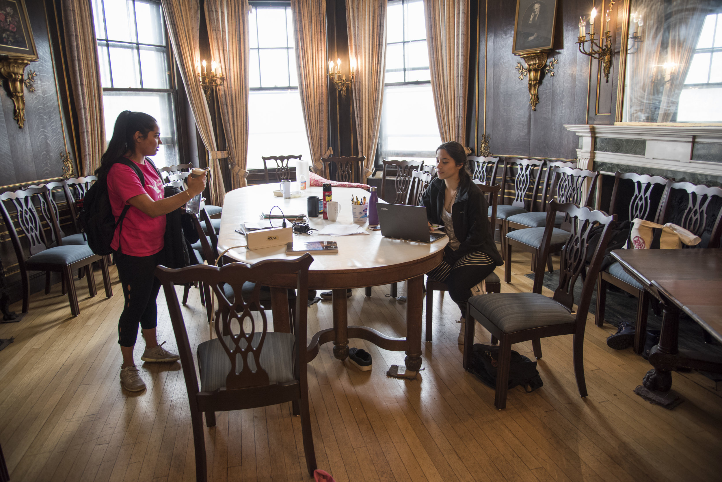  Erica Moreira (right), a Junior at Boston University, studies and talks to fellow housemate Nikita Limaye in the dining room of the Harriet E. Richards--or HER--house, a women's cooperative residence hall at Boston University. 