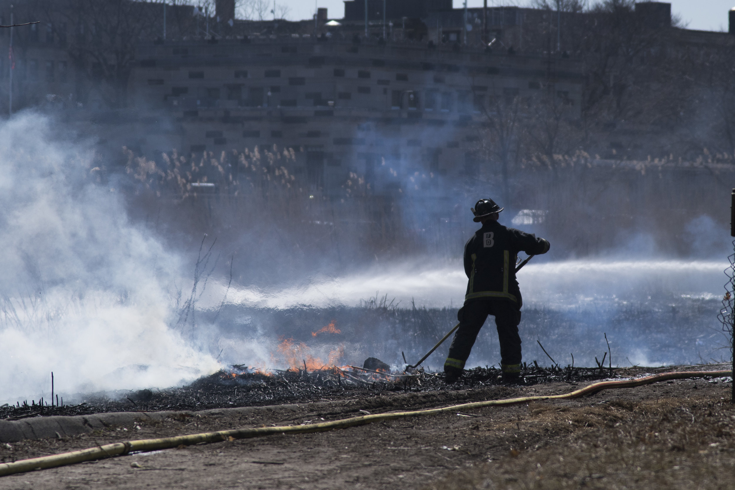  Firefighters put out the last embers of a brush fire in the Back Bay Fens March 28, 2019. Although officials were not sure what exactly started the blaze, the dryness of the park's plant life was a contributing factor. Fires such as these are relati