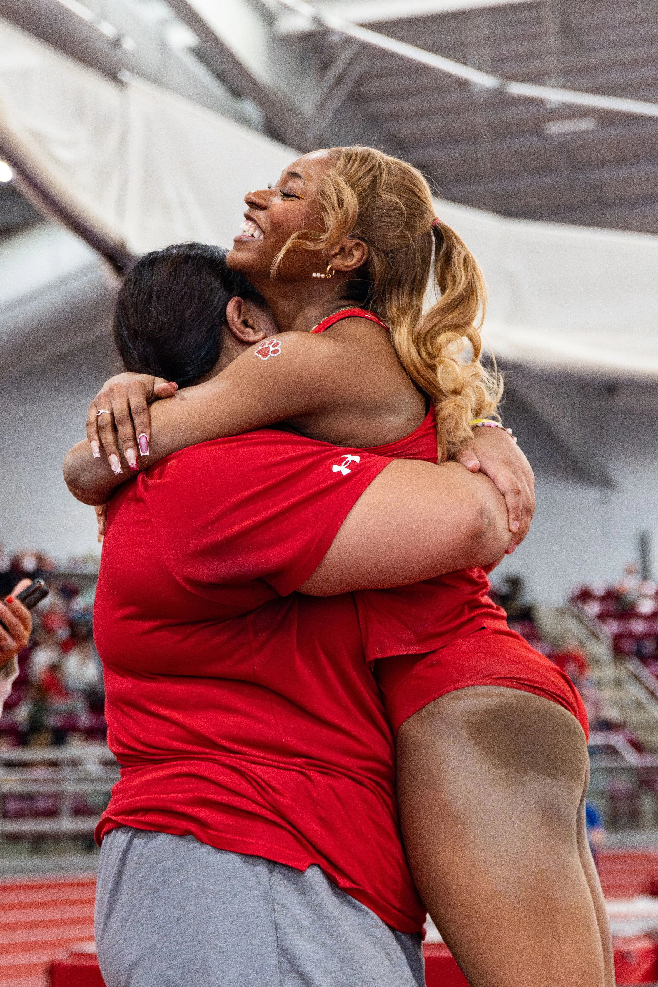  Peace Omonzane of Boston University celebrates with her teammates at the 2026 Patriot League Indoor Track &amp; Field Championships held at Boston University. 