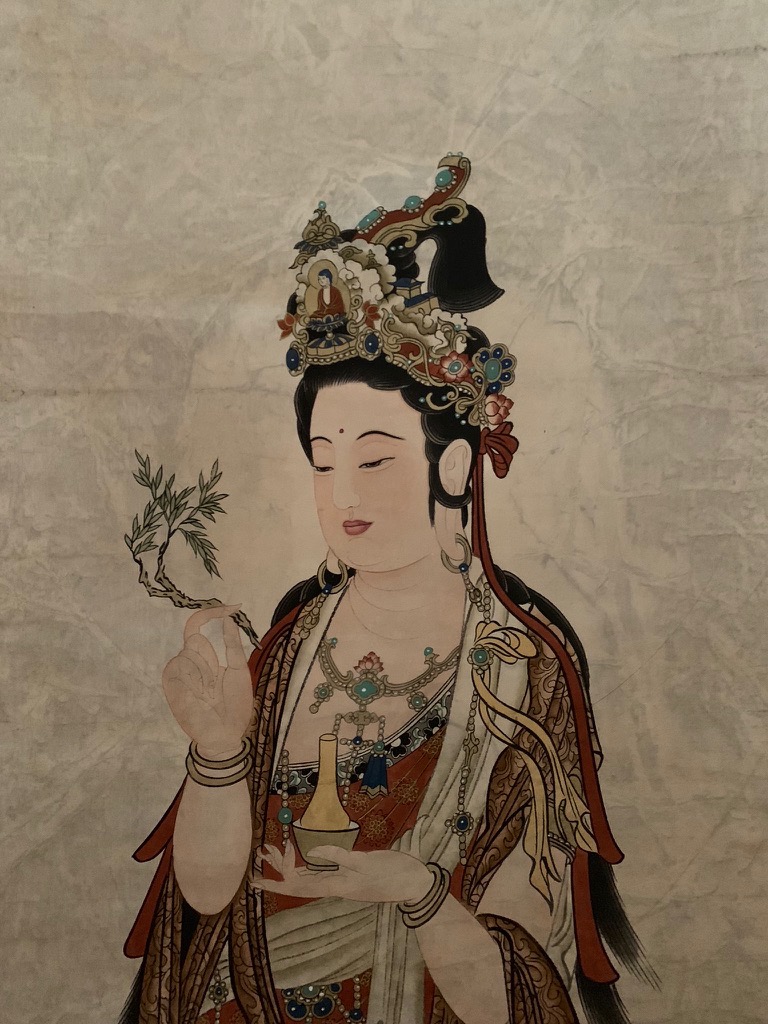 Goddess of mercy, often depicted as both male and female to show this figure's limitless transcendence beyond gender
