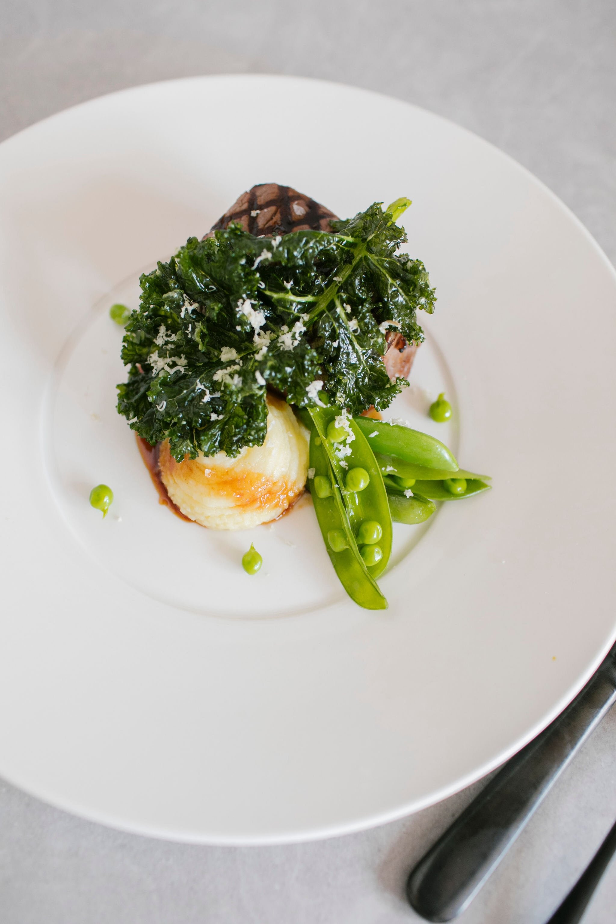 Char grilled eye fillet, smoked mash potato, snap peas, crispy kale, horseradish and port jus (gf) (1).jpg