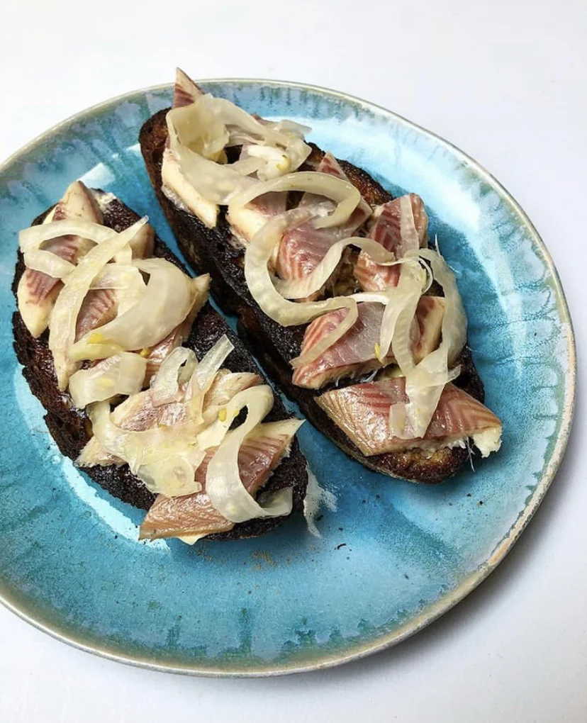 Sourdough toast, salted butter, smoked eel and fermented lemon fennel. Sourdough is ALWAYS invited to #Muffdining
