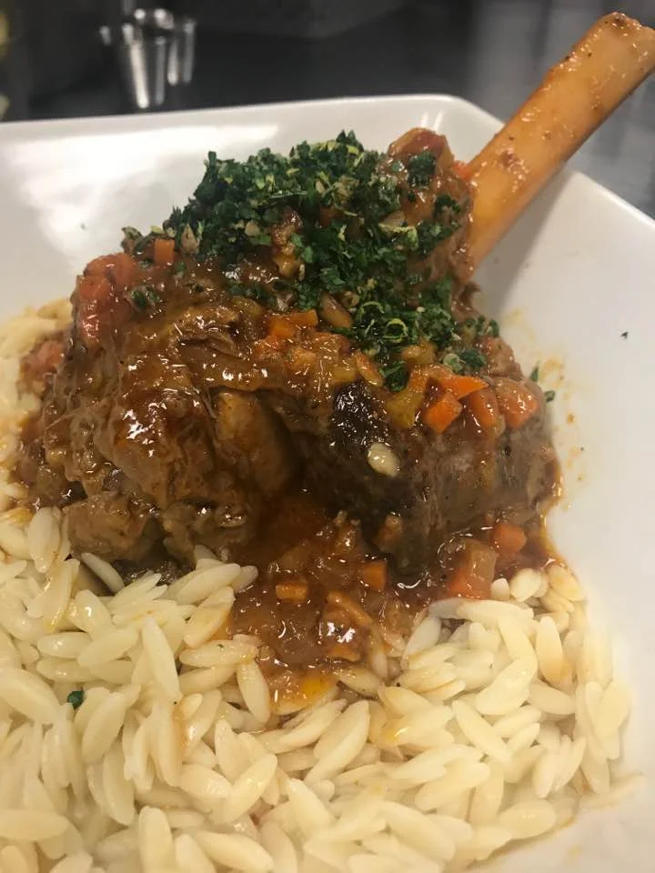 Braised lamb shank over orzo