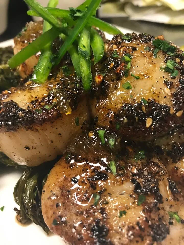 Dry pack scallops with a Korean dry rub finished with a house orange marmalade